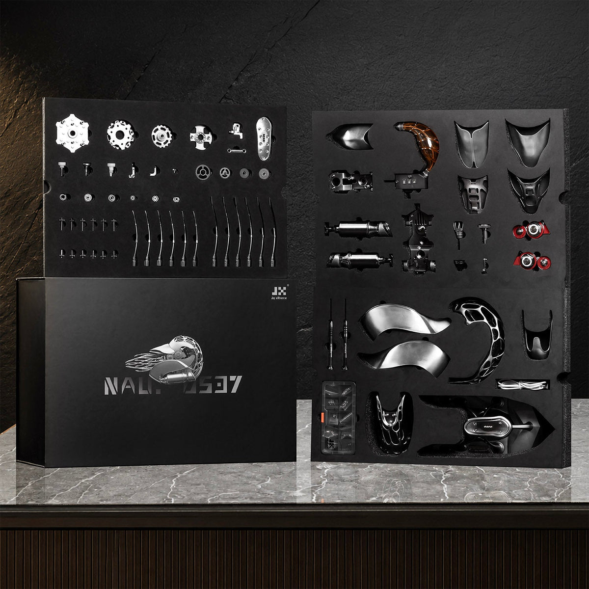Mecha Naut Natural Metal — the assembly kit laid out in black foam trays, brushed panels, gears and tentacle rods each in their own cutout, mechanical sculpture by IFL Watches.