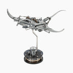 Mecha Ray Natural Metal — unpainted manta with wings spread and the gear train open to view, on a weighted drive base, kinetic sculpture by IFL Watches.