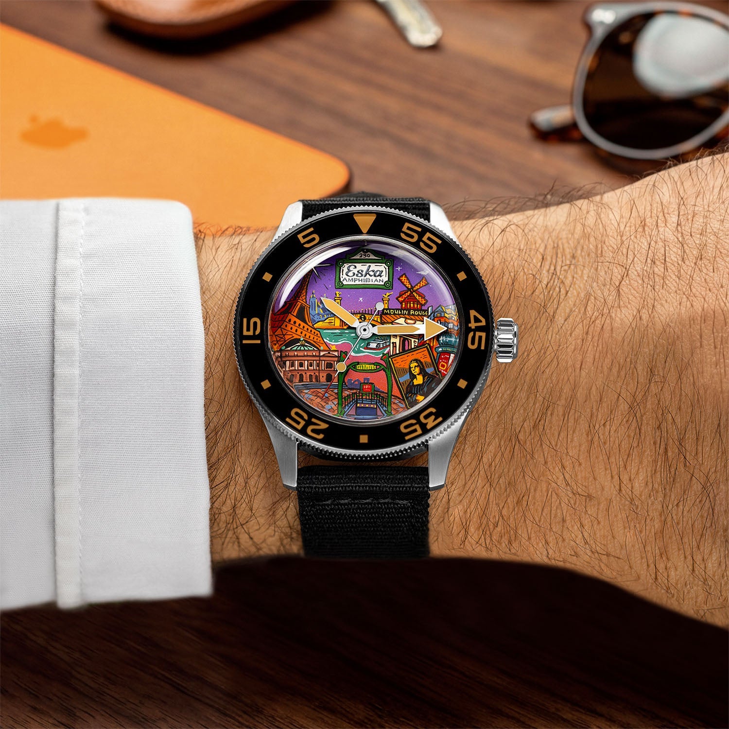 ESKA Amphibian Cœur de Paris — On the wrist over a white cuff, custom hand-painted city dial in daylight, limited edition by IFL Watches.