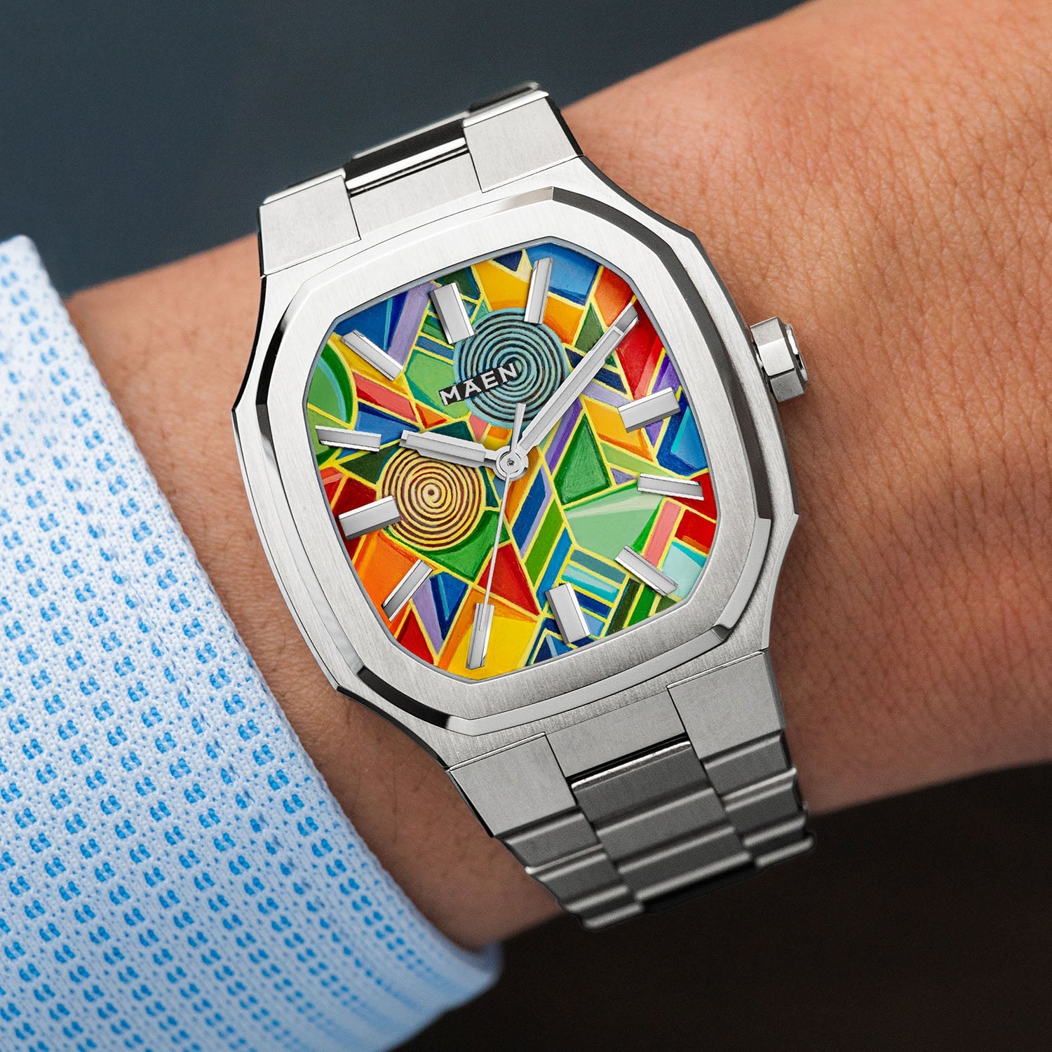 MAEN Manhattan Paradox — detail view of the hand-painted dial showing chevron and mesh patterns layered with primary-meets-jewel color blocks, limited edition timepiece by IFL Watches.