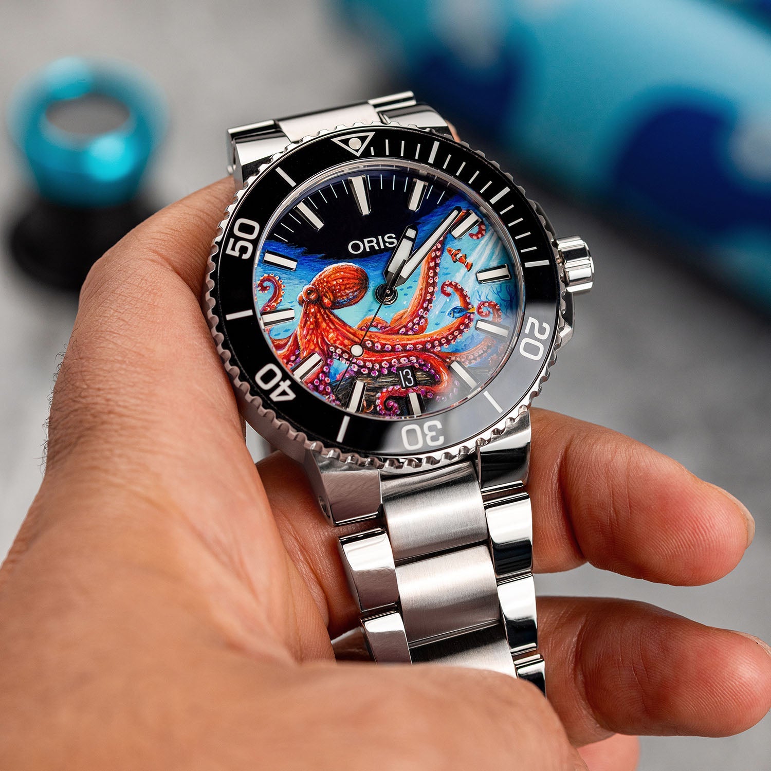 Aquis Octopus Concept – bespoke Oris Aquis dive watch with a hand-painted octopus motif, blue swirling currents, and marine-inspired elements, blending Swiss precision with oceanic beauty. Customized by IFL Watches.