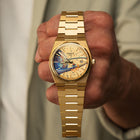 PRX Gold Surfer Concept—hand-painted custom dial with astronaut artwork on a gold-coated 40mm Tissot PRX by IFL Watches.