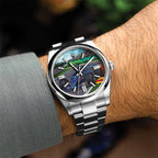 Apex Concept — Hand-painted custom dial angled on the wrist, race car and packed grandstand under a clouded sky, a bespoke timepiece by IFL Watches.