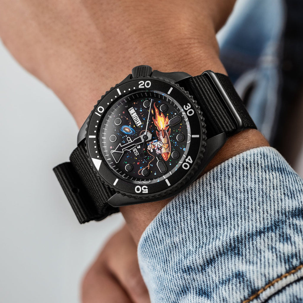 Space Cowboy Concept – Hand-painted custom Seiko 5 Sports featuring cosmic cowboy riding rocket through space, bespoke timepiece by IFL Watches