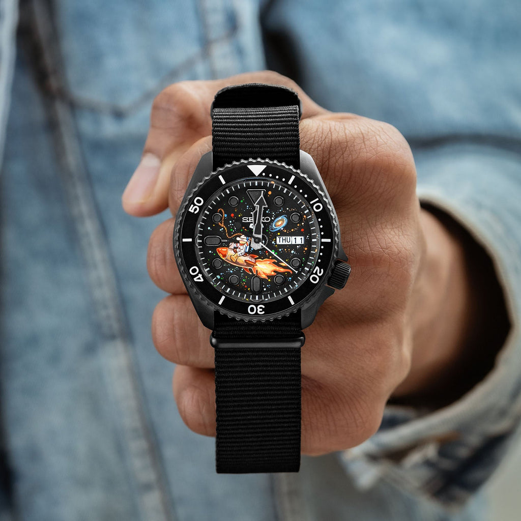 Space Cowboy Concept – Hand-painted custom Seiko 5 Sports featuring cosmic cowboy riding rocket through space, bespoke timepiece by IFL Watches