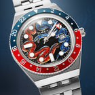 Timex Q GMT Twin Serpents – hand-painted custom limited-edition watch featuring red and blue serpents on the dial by IFL Watches, 38mm stainless steel case, and quartz movement with GMT.