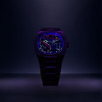 Bulova Super Seville Scream — Standing upright in a darkened studio under UV light, the neon strokes and the figure's outline glowing across the dial, limited edition timepiece by IFL Watches