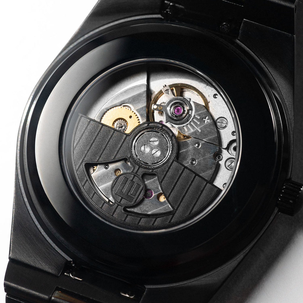 Canvax caseback view — matte black stainless steel case of a hand-painted bespoke timepiece by IFL Watches.
