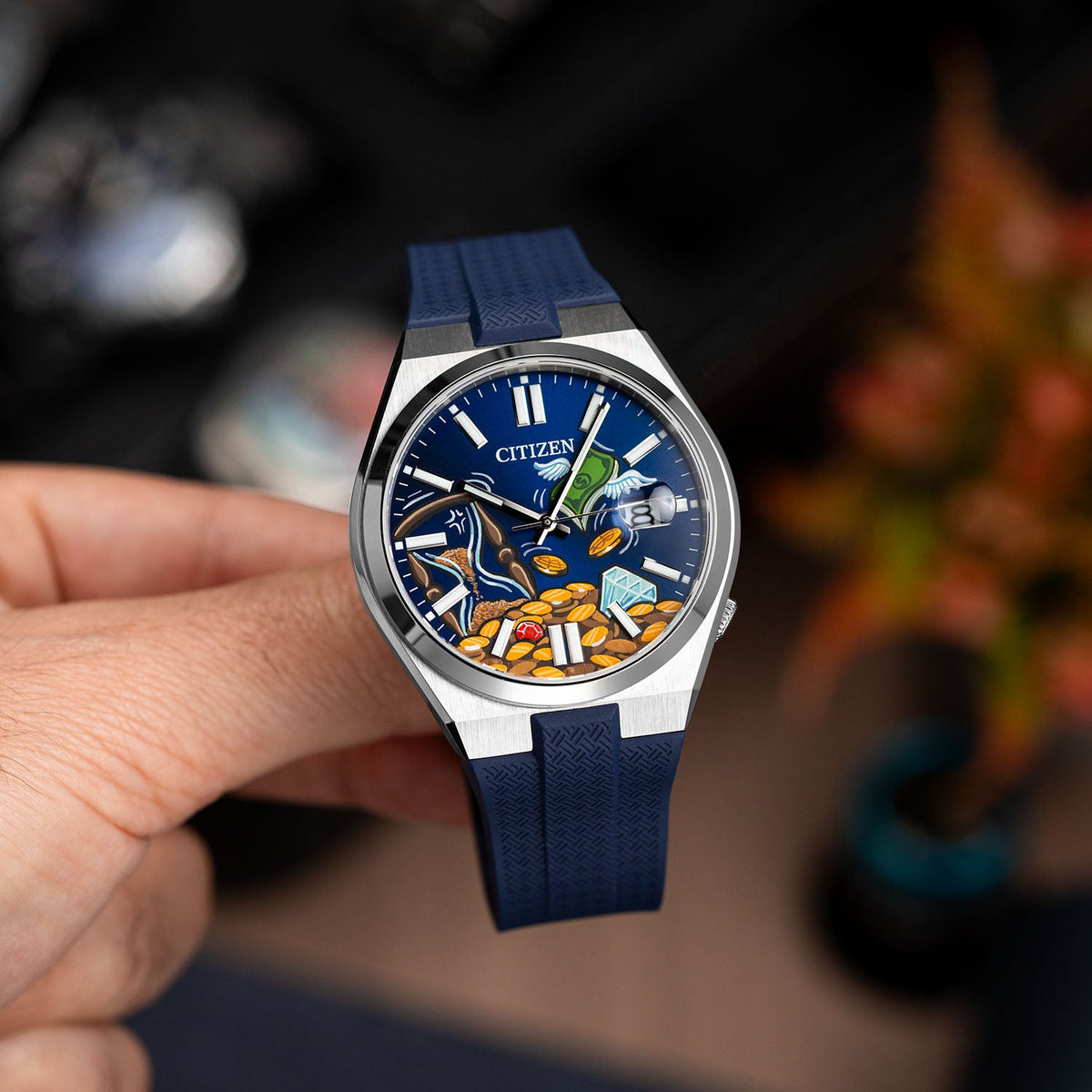 Citizen Tsuyosa Strap – Blue FKM strap fitted to the hand-painted Time Is Money Concept by IFL Watches, angled view in the hand
