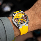 Citizen Tsuyosa Strap – Yellow FKM strap shown at an angle on the wrist with the hand-painted Wise Guys Concept by IFL Watches