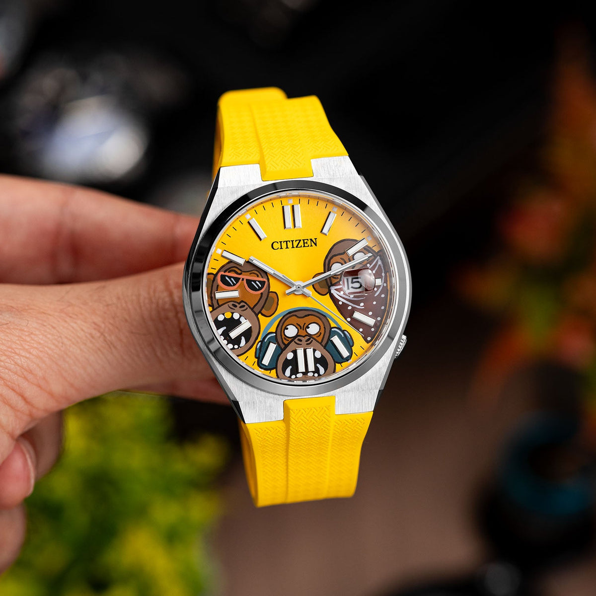 Citizen Tsuyosa Strap – Yellow FKM strap fitted to the hand-painted Wise Guys Concept by IFL Watches, angled view in the hand