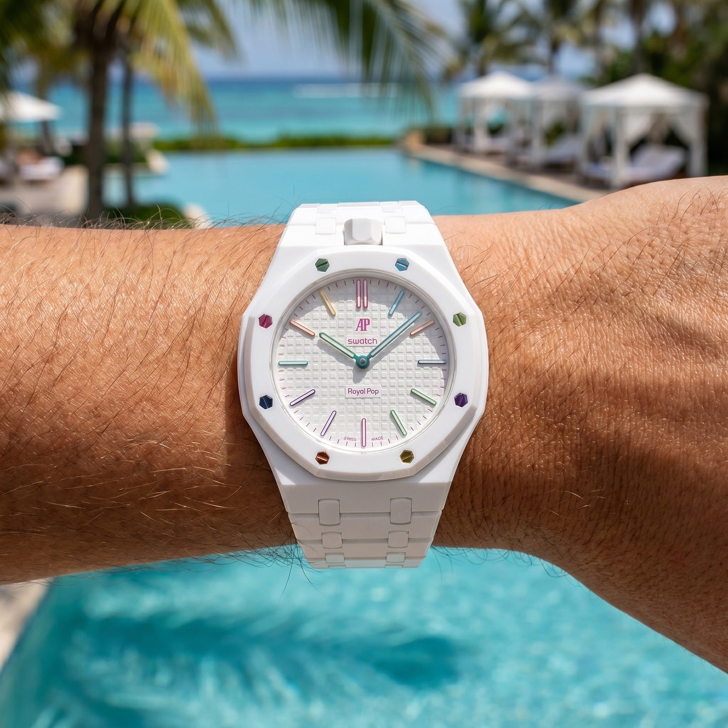Huit Blanc Swatch × AP Royal Pop Ceramic Case-Strap — worn in a poolside scene, by IFL Watches