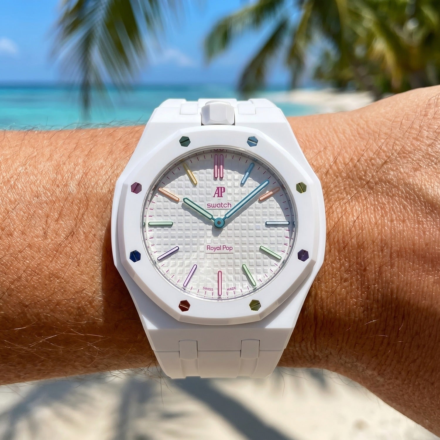 Huit Blanc Swatch × AP Royal Pop Rubber Case-Strap — worn in a beach scene, by IFL Watches