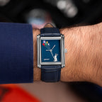 Laphont Bloc Skybound — Seen straight on at the wrist, the navy cuff pushed back from the stepped steel case as the kites climb across the dial, a custom limited edition watch by IFL Watches