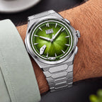 Lucky Harvey Chiming Watch 2.0 Green — Worn on wrist at an angle, showing the crown and pushers, available at IFL Watches.
