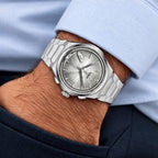 Lucky Harvey Chiming Watch 2.0 Silver — Worn on wrist with a hand in the pocket, available at IFL Watches.