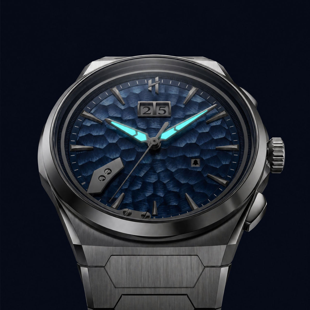 Lucky Harvey Hammered Chiming Watch 1.0 Ocean Blue — In the dark, showing the luminous hands, available at IFL Watches.