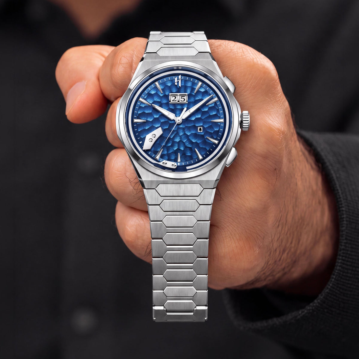 Lucky Harvey Hammered Chiming Watch 1.0 Ocean Blue — Held in hand, showing the hammered blue dial, available at IFL Watches.