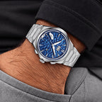 Lucky Harvey Hammered Chiming Watch 1.0 Ocean Blue — Worn on wrist with a white shirt cuff, available at IFL Watches.