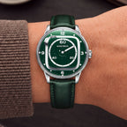 Mandetbrote Orbital II Green — Worn on wrist with a brown cuff, showing the hour rail and minute display, available at IFL Watches.