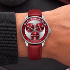 Mandetbrote Wandering Hour Burgundy — Worn on wrist with a charcoal sleeve, showing the wandering hour display, available at IFL Watches.
