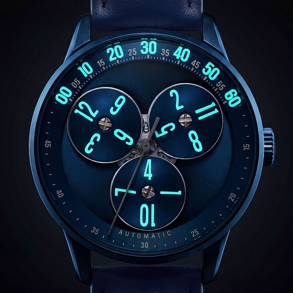 Mandetbrote Wandering Hour Dark Blue — In the dark, with the hour numerals and minute track glowing, available at IFL Watches.