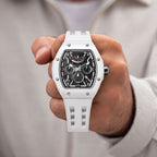 Tsar Bomba Atomic White — Held in hand, showing the open-worked dial and screwed bezel, available at IFL Watches.