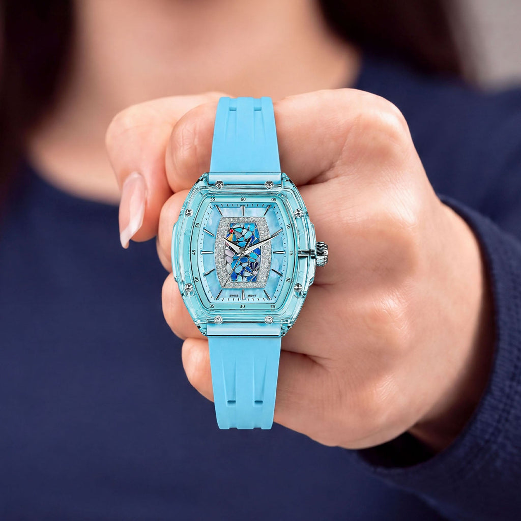 Tsar Bomba Nucleus Femme 02 Blue — Held in hand, showing the transparent case and rose-gold screws, available at IFL Watches.