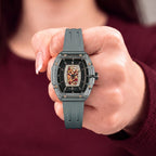 Tsar Bomba Nucleus Femme 02 Grey — Held in hand, showing the transparent case and rose-gold screws, available at IFL Watches.